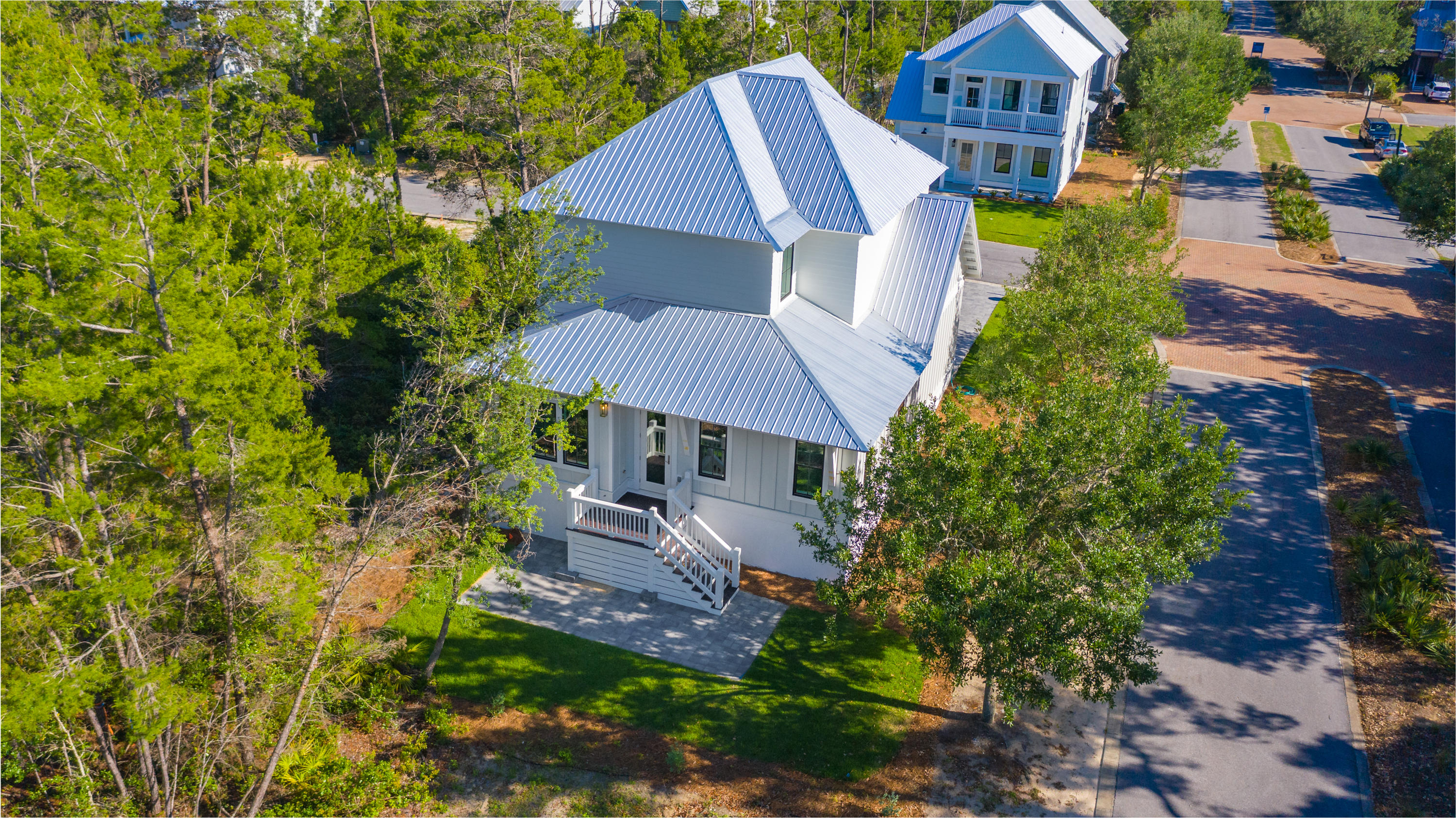 15 Lake Mist Ln Inlet Beach Inlet Beach, FL 32461 - Photo 48 of 48 a aerial view of a house with a yard