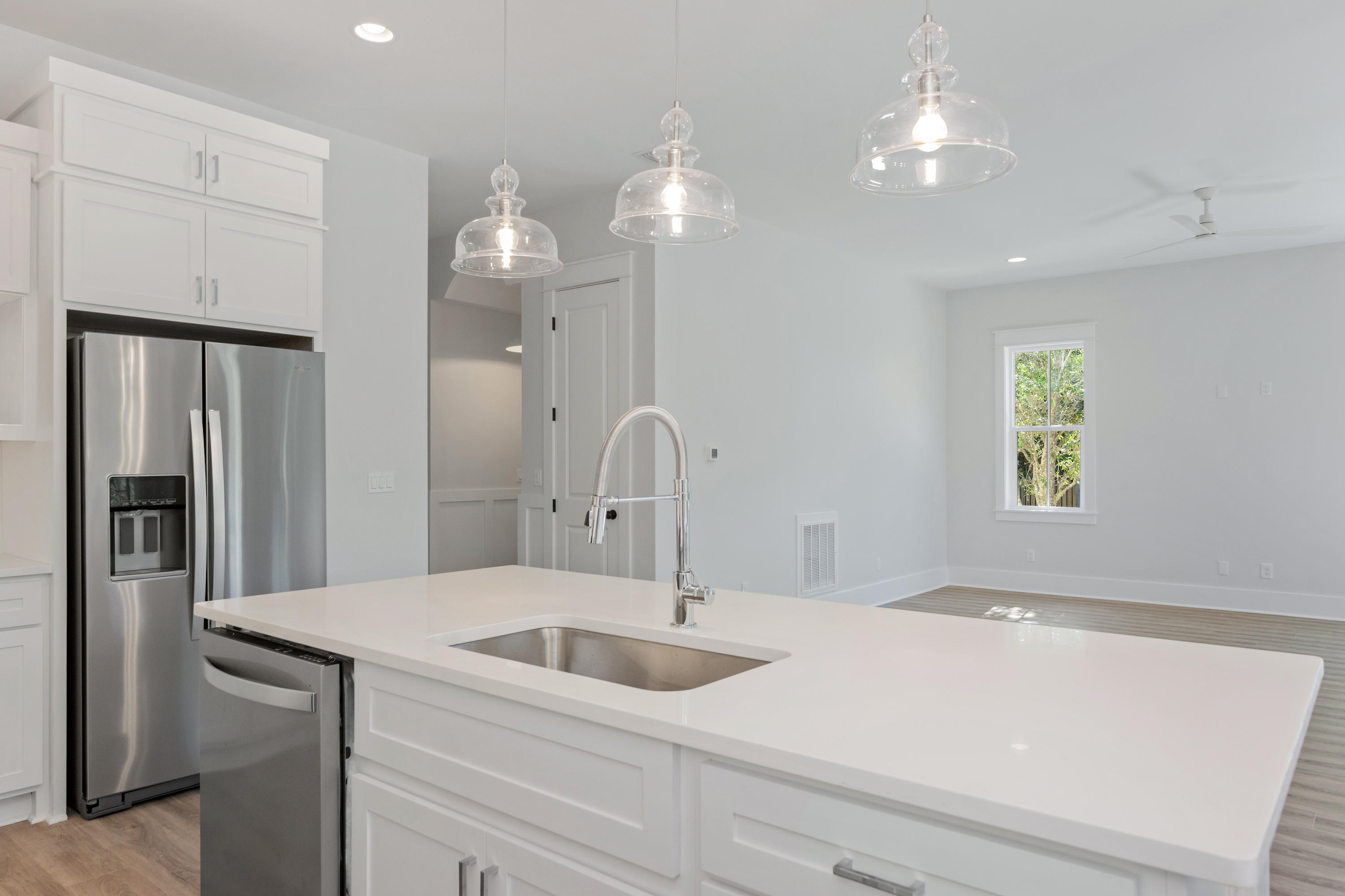 15 Lake Mist Ln Inlet Beach Inlet Beach, FL 32461 - Photo 9 of 48 a kitchen with a sink and a refrigerator