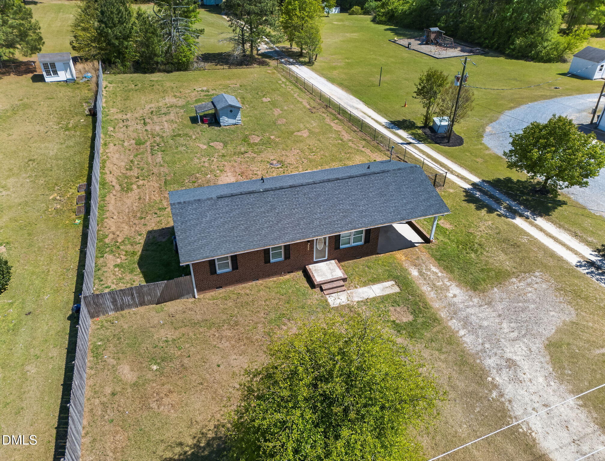 6086 Red Hill Church Road Coats, NC 27521 - Photo 32 of 44 swimming pool view with a garden view
