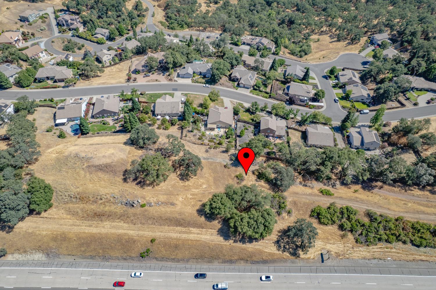 0 Crazy Horse Road Cameron Park, CA 95682 - Photo 30 of 64 an outdoor view of a house