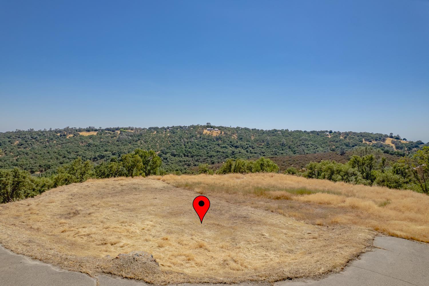 0 Crazy Horse Road Cameron Park, CA 95682 - Photo 4 of 64 a view of a road with an ocean beach