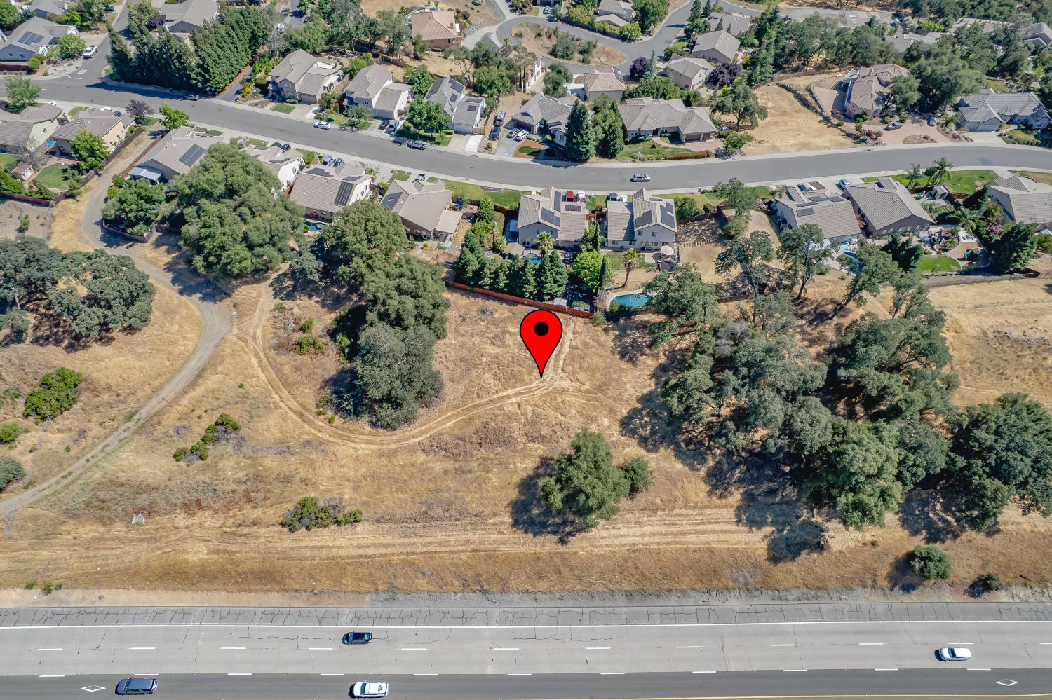 0 Crazy Horse Road Cameron Park, CA 95682 - Photo 51 of 64 an aerial view of a houses with a yard and mountain