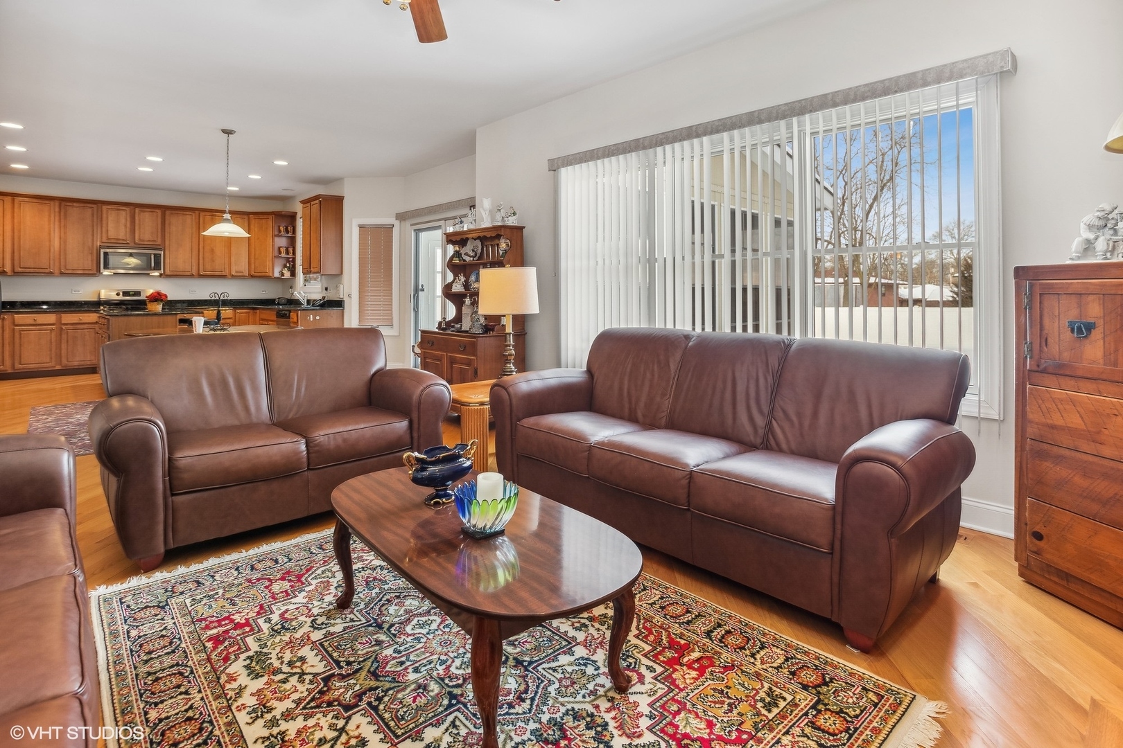 1034 East Woodrow Avenue Lombard, IL 60148 - Photo 13 of 36 a living room with furniture kitchen view and a large window