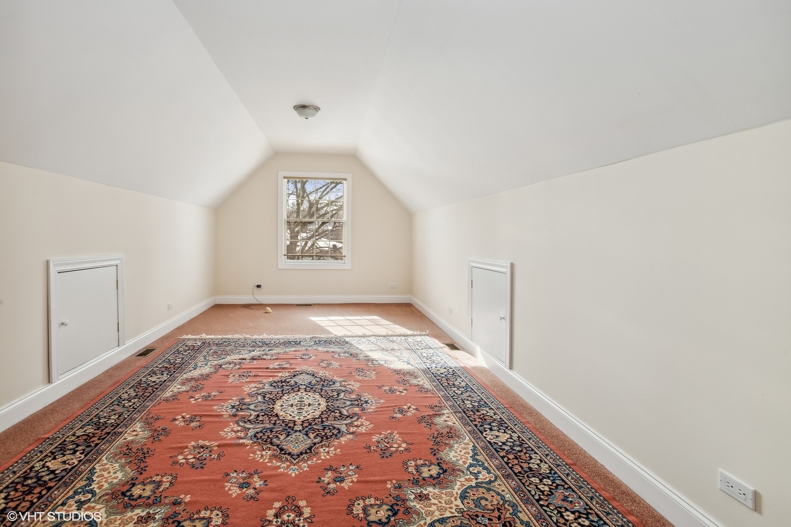 1034 East Woodrow Avenue Lombard, IL 60148 - Photo 18 of 36 an empty room with a rug