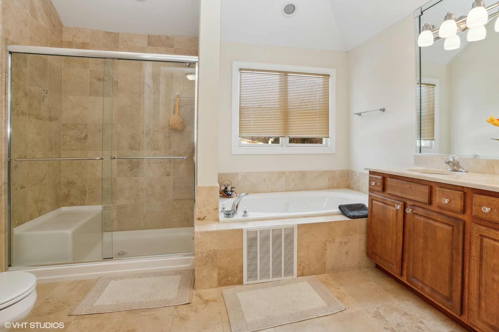 1034 East Woodrow Avenue Lombard, IL 60148 - Photo 19 of 36 a bathroom with a bathtub shower sink and toilet