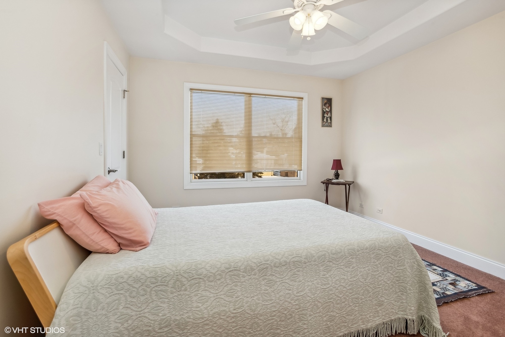 1034 East Woodrow Avenue Lombard, IL 60148 - Photo 21 of 36 a bedroom with a large bed and a window