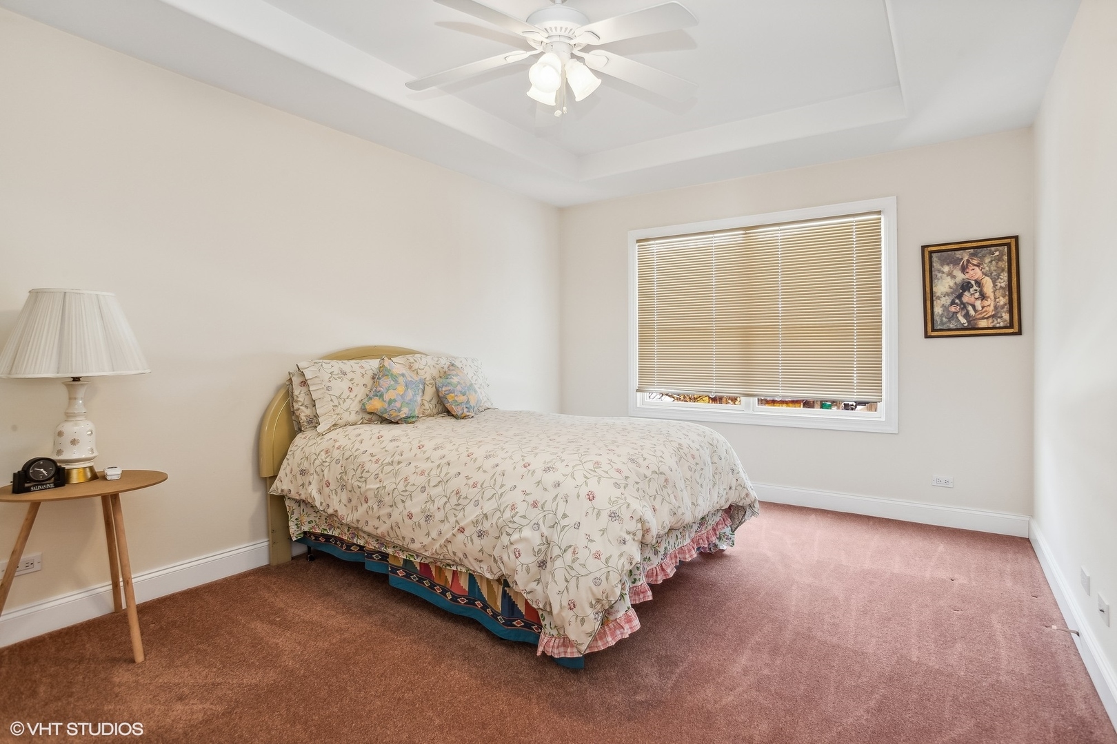 1034 East Woodrow Avenue Lombard, IL 60148 - Photo 22 of 36 a spacious bedroom with a bed and a table