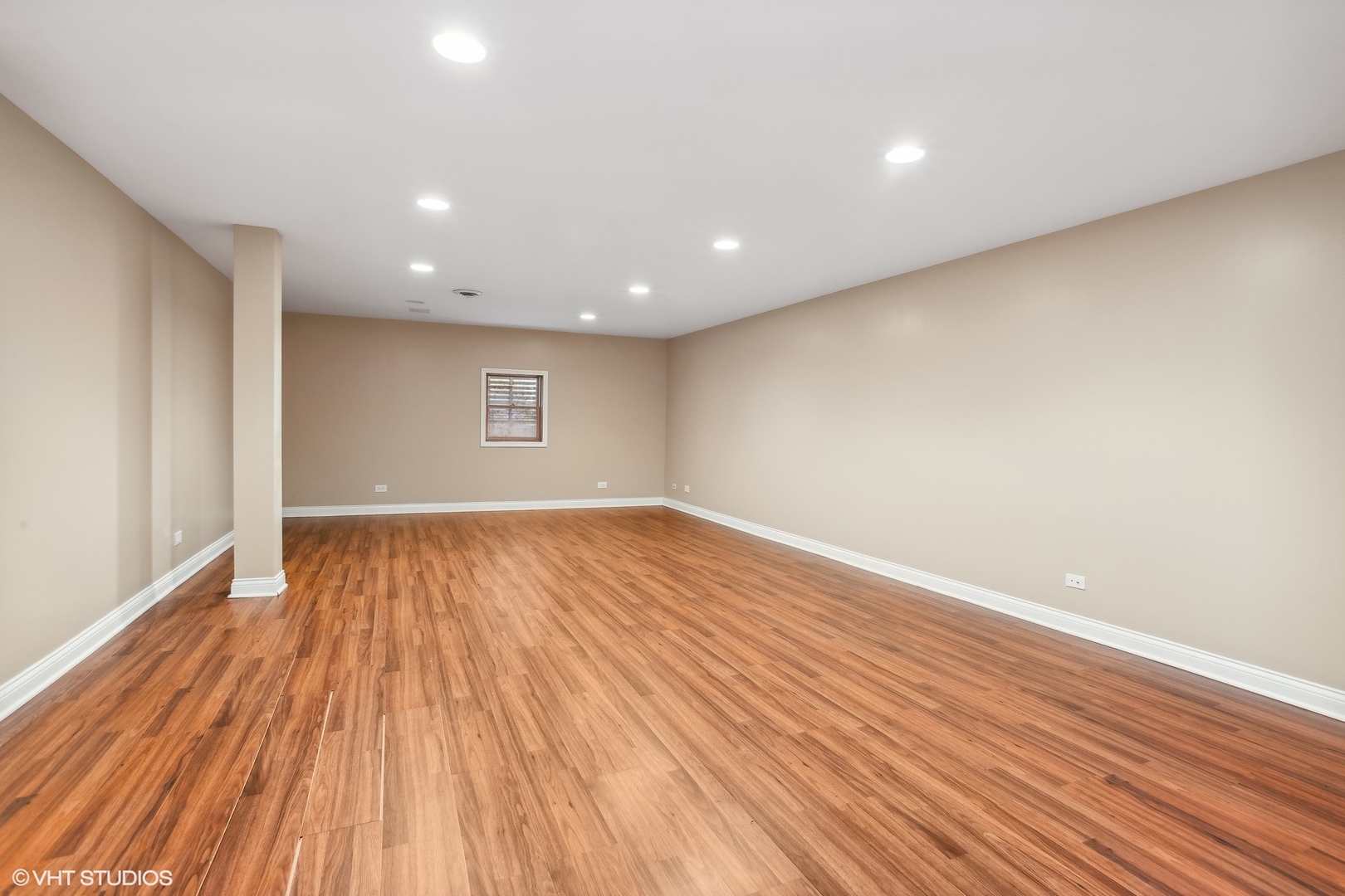 1034 East Woodrow Avenue Lombard, IL 60148 - Photo 27 of 36 an empty room with wooden floor and windows