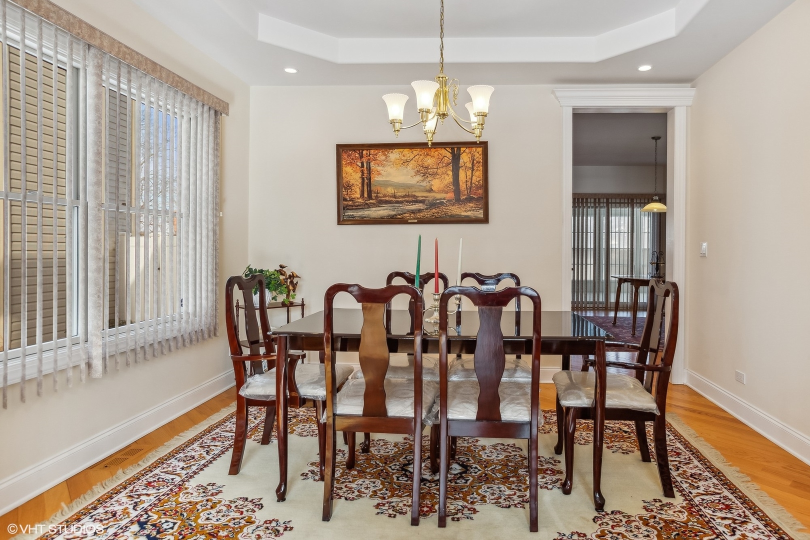 1034 East Woodrow Avenue Lombard, IL 60148 - Photo 6 of 36 a view of a dining room with furniture and wooden floor