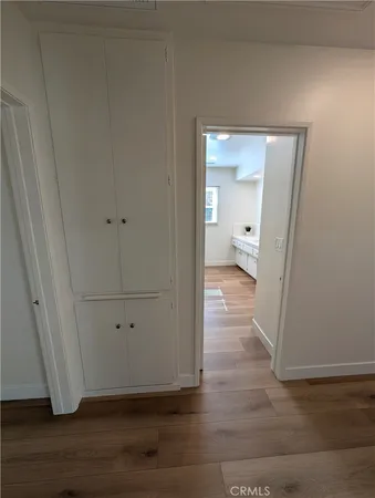 a bathroom with a double vanity sink and mirror