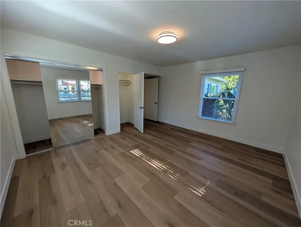 a bathroom with a bathtub and a toilet