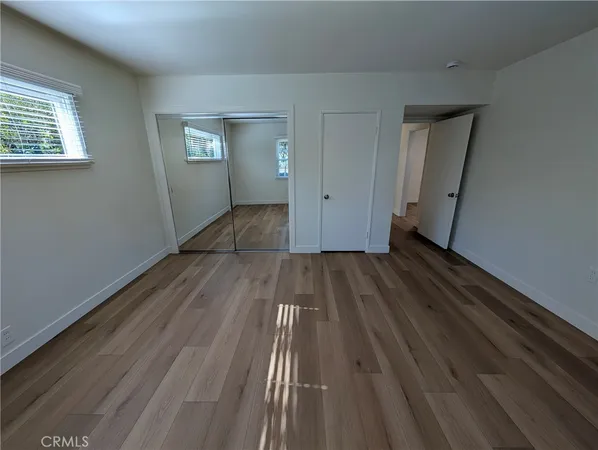 a bathroom with a toilet and a bathtub