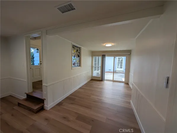 a kitchen with stainless steel appliances granite countertop wooden cabinets a sink and a stove