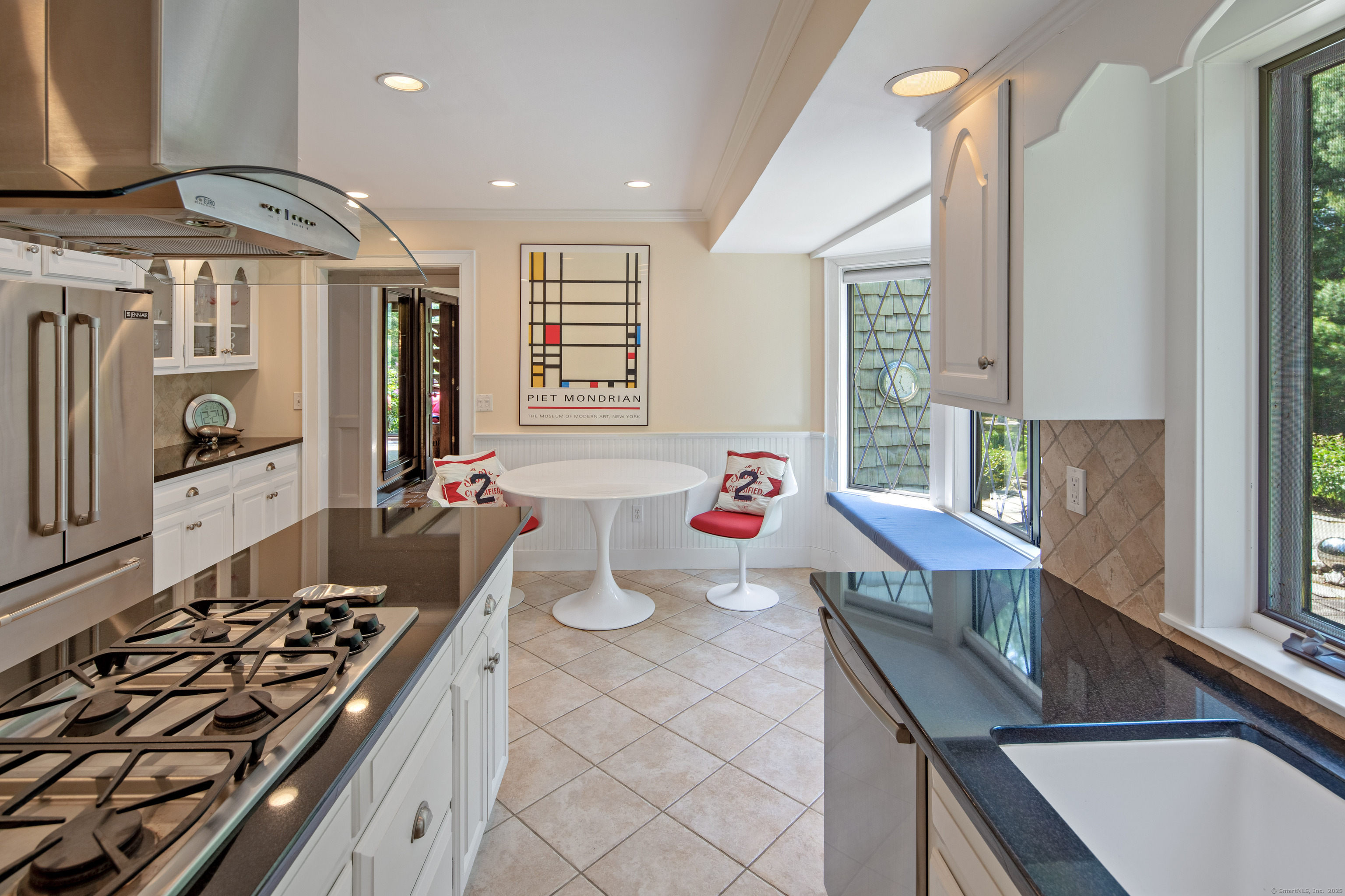 15 Tunxis Trail Redding, CT 06896 - Photo 13 of 27 a kitchen with a stove a sink and a refrigerator