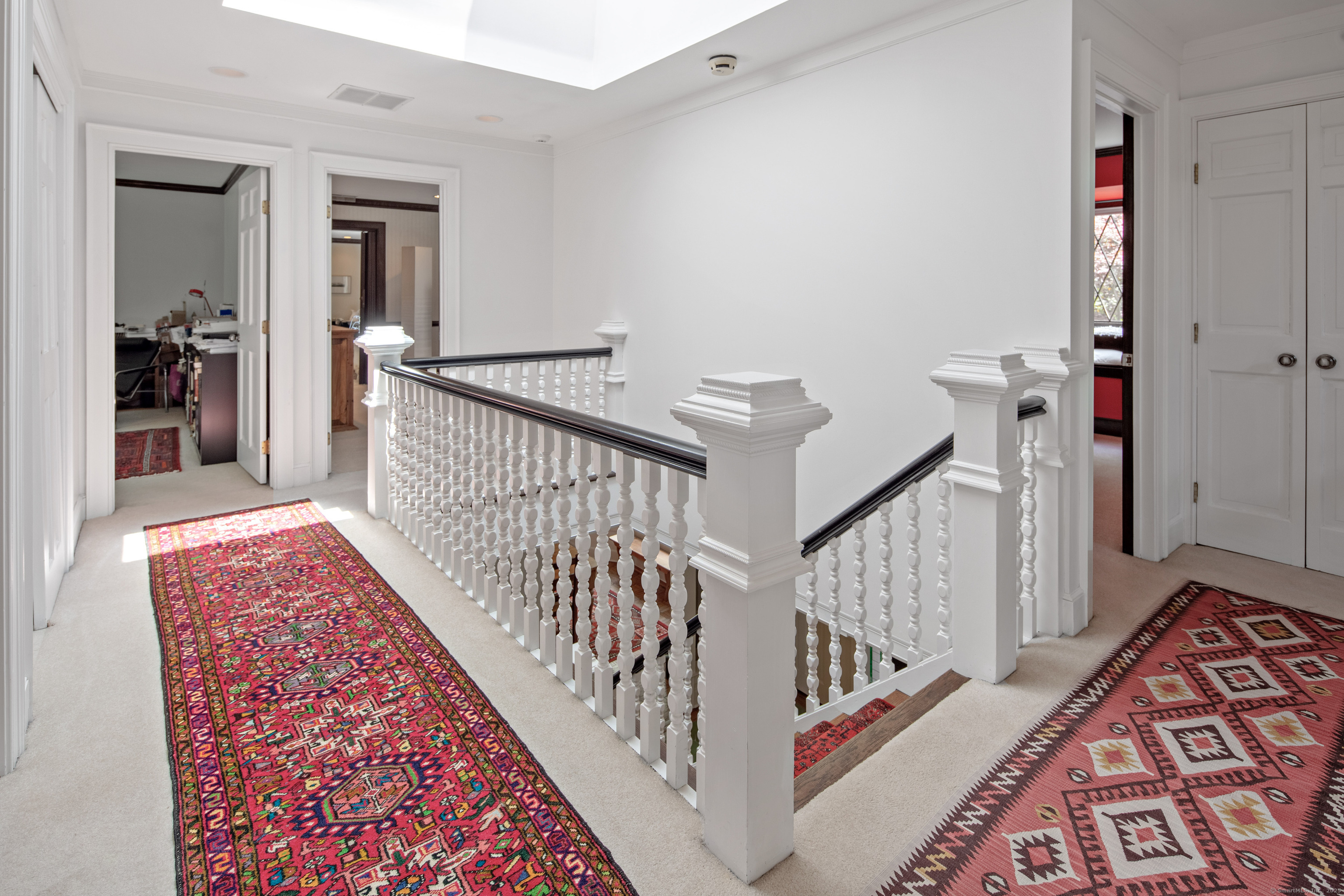 15 Tunxis Trail Redding, CT 06896 - Photo 16 of 27 a view of staircase with white walls