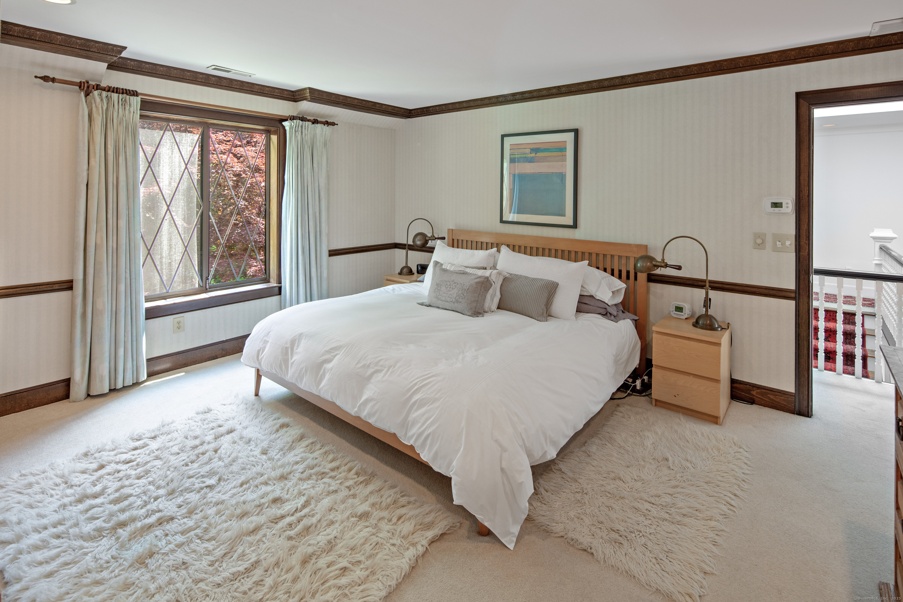 15 Tunxis Trail Redding, CT 06896 - Photo 17 of 27 a bedroom with a bed and a window