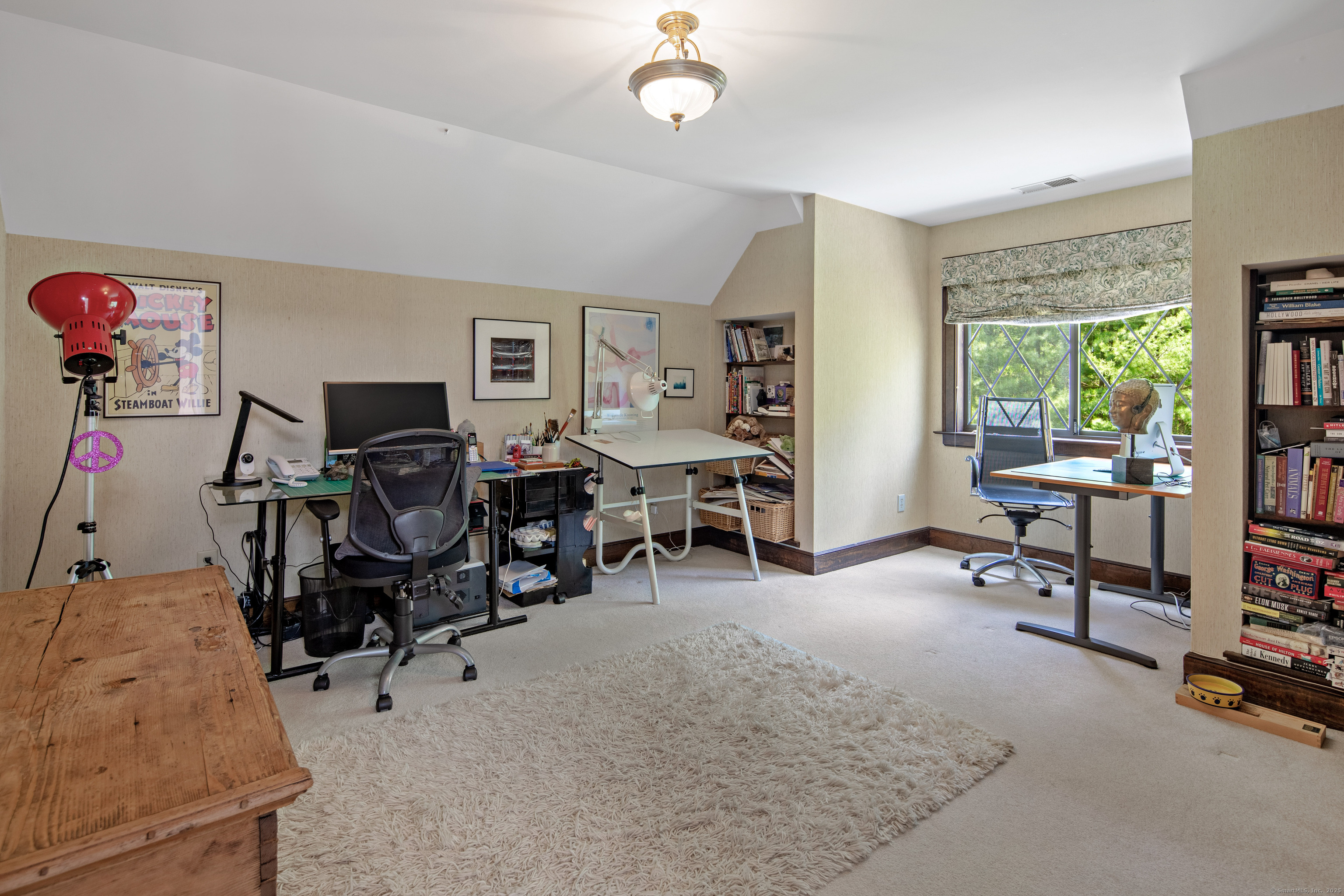 15 Tunxis Trail Redding, CT 06896 - Photo 21 of 27 a view of a workspace with furniture and a livingroom