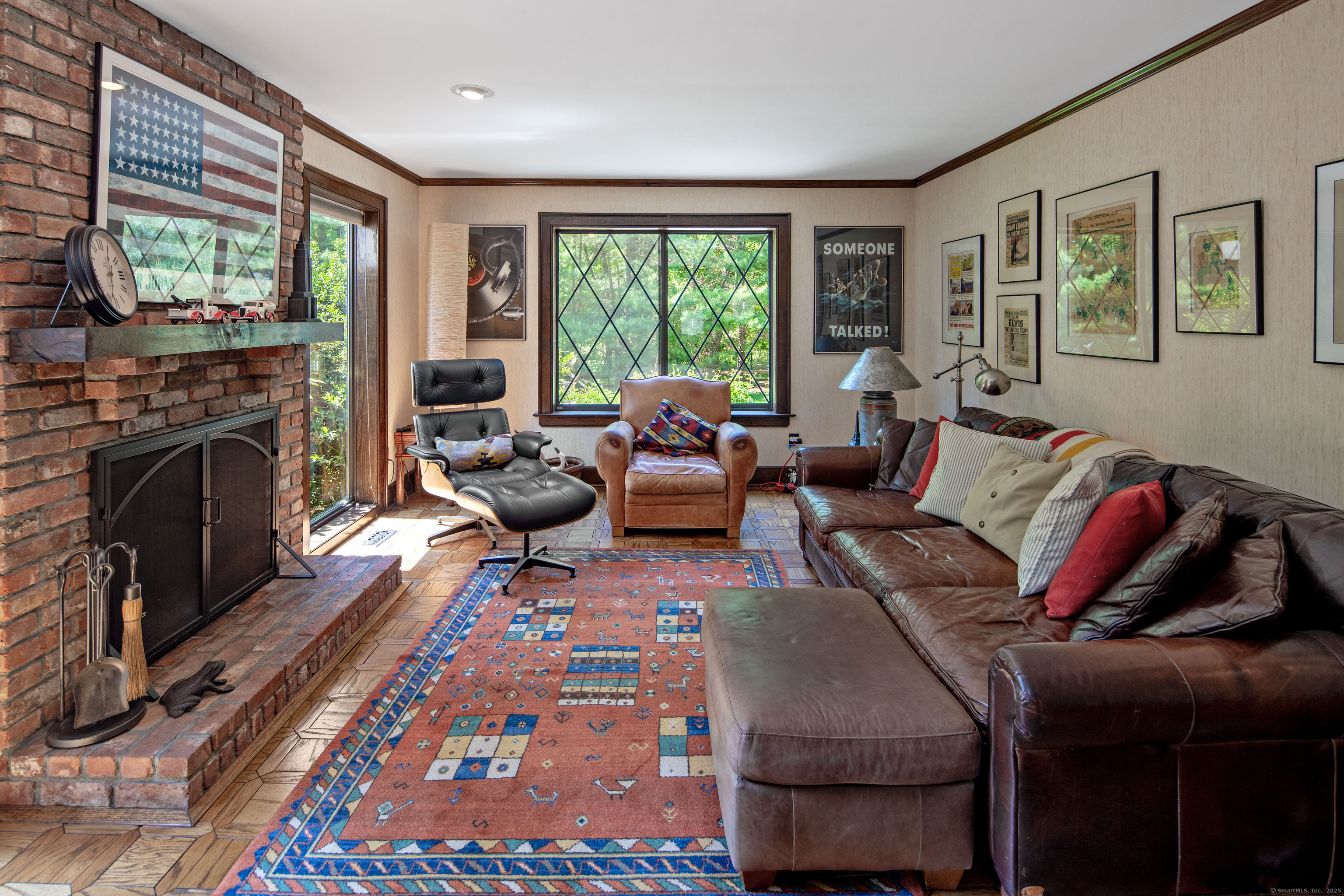 15 Tunxis Trail Redding, CT 06896 - Photo 9 of 27 a living room with furniture and a fireplace