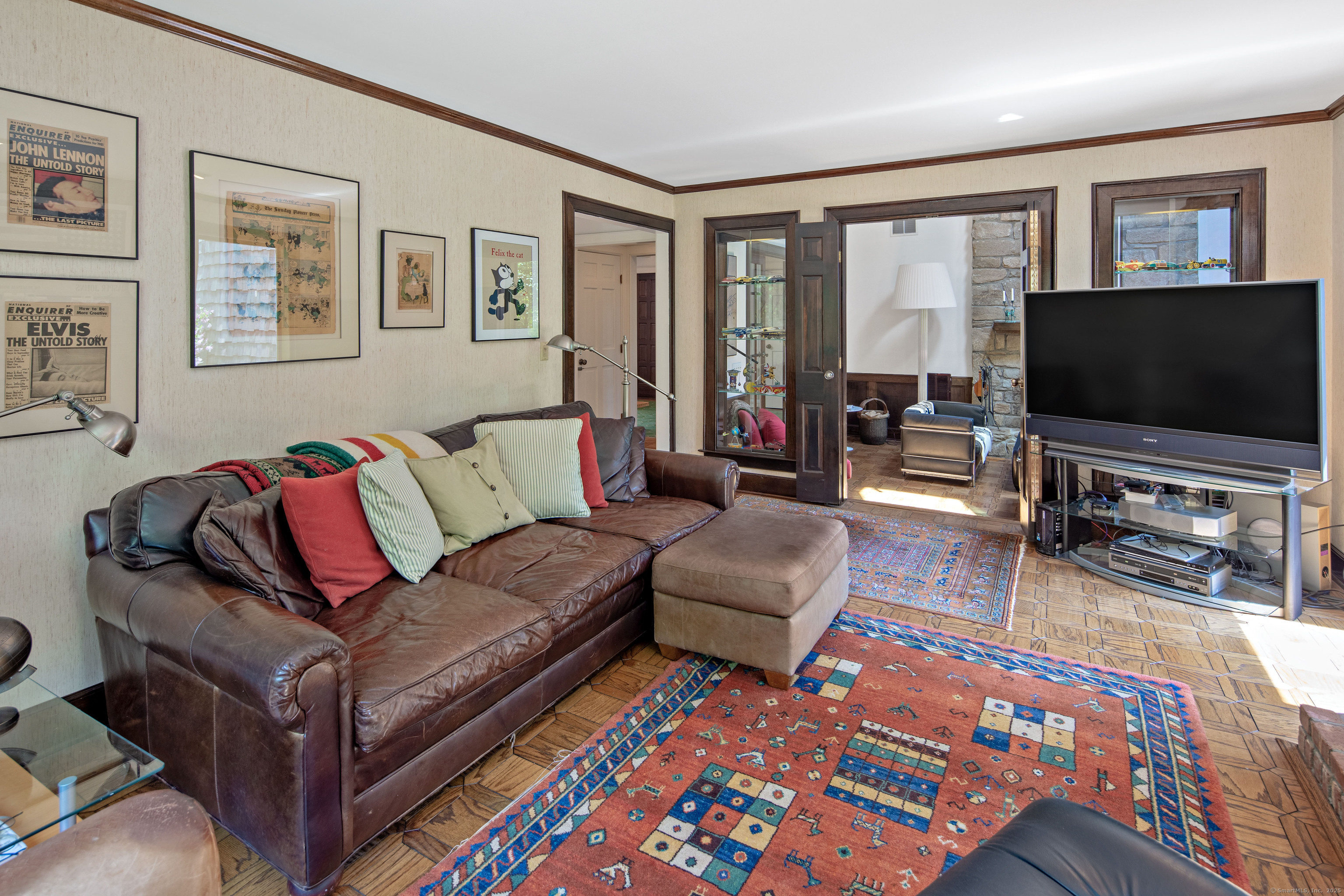 15 Tunxis Trail Redding, CT 06896 - Photo 10 of 27 a living room with furniture and a flat screen tv