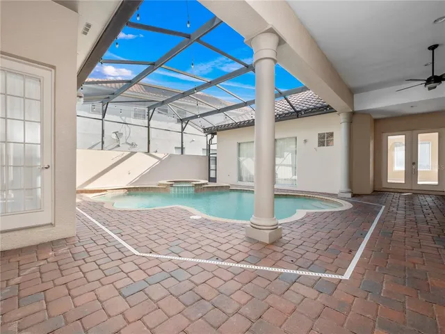 a view of an empty room with empty shelves