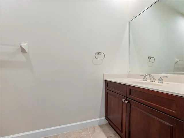 a view of empty room with windows