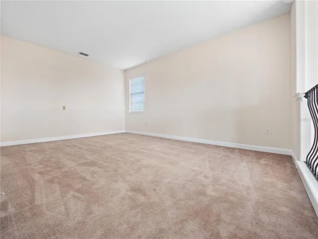 a view of a garden and basketball court