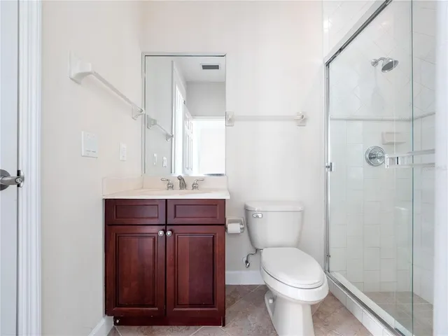 a view of an empty room with a fireplace