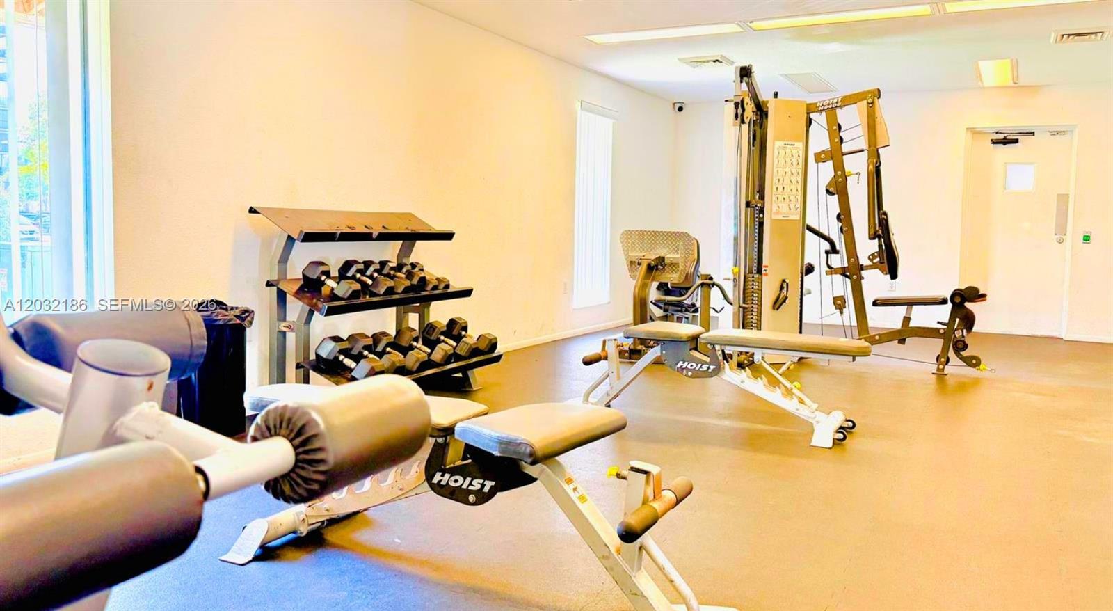 4164 Inverrary Drive, Unit 204 Lauderhill, FL 33319 - Photo 24 of 28 a view of a room with gym equipment