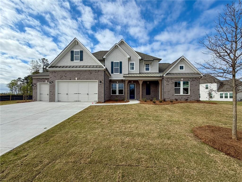 684 Crest Line Trail Powder Springs, GA 30127 - Photo 1 of 1 a front view of a house with a garden