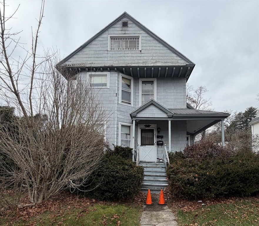 a front view of a house with porch