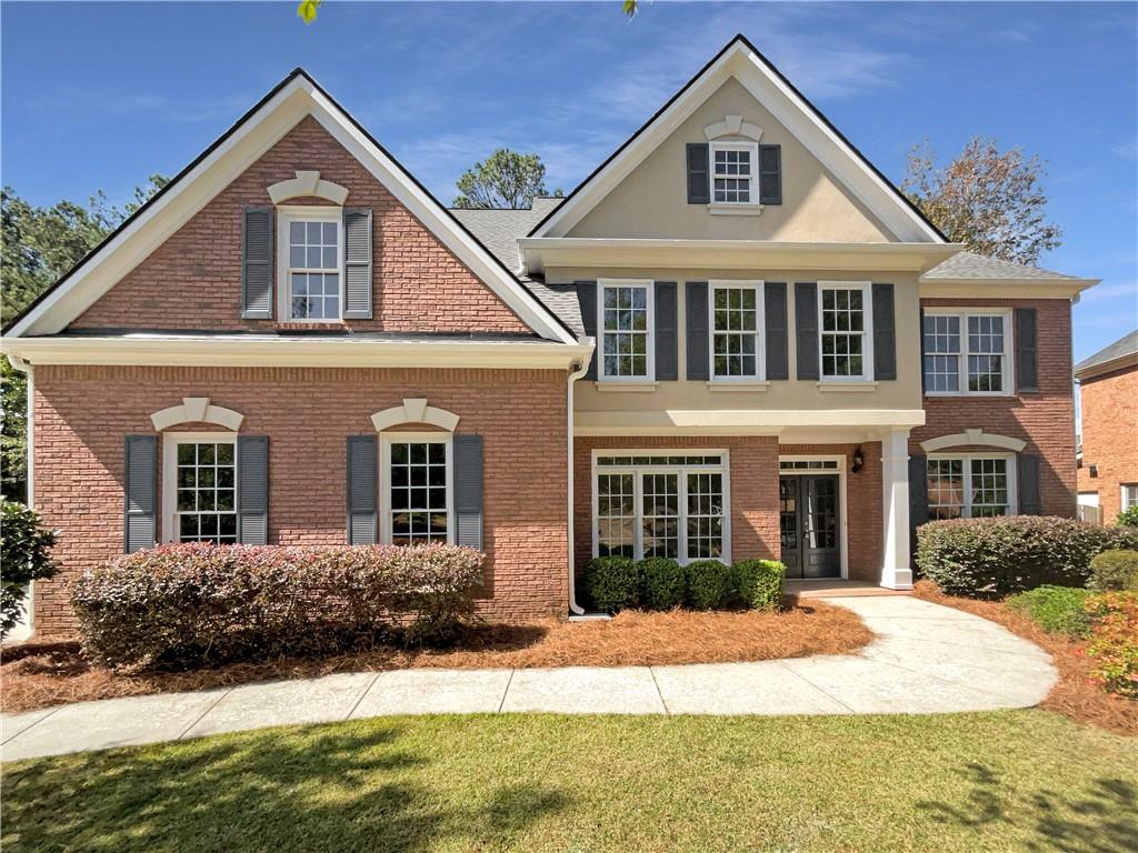 2579 Middleton Way Grayson, GA 30017 - Photo 1 of 1 a front view of a house with a yard