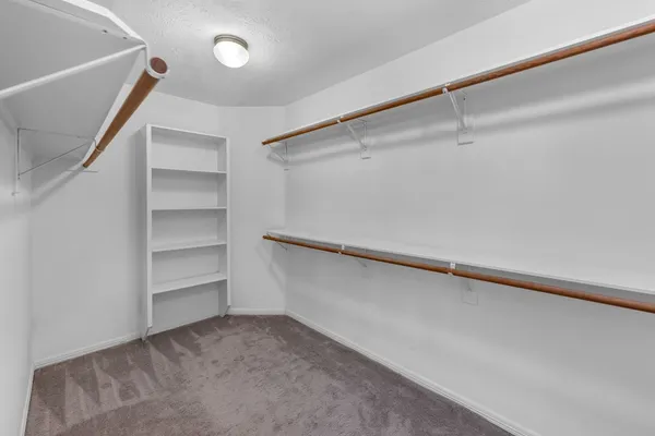 a view of an empty walk in closet