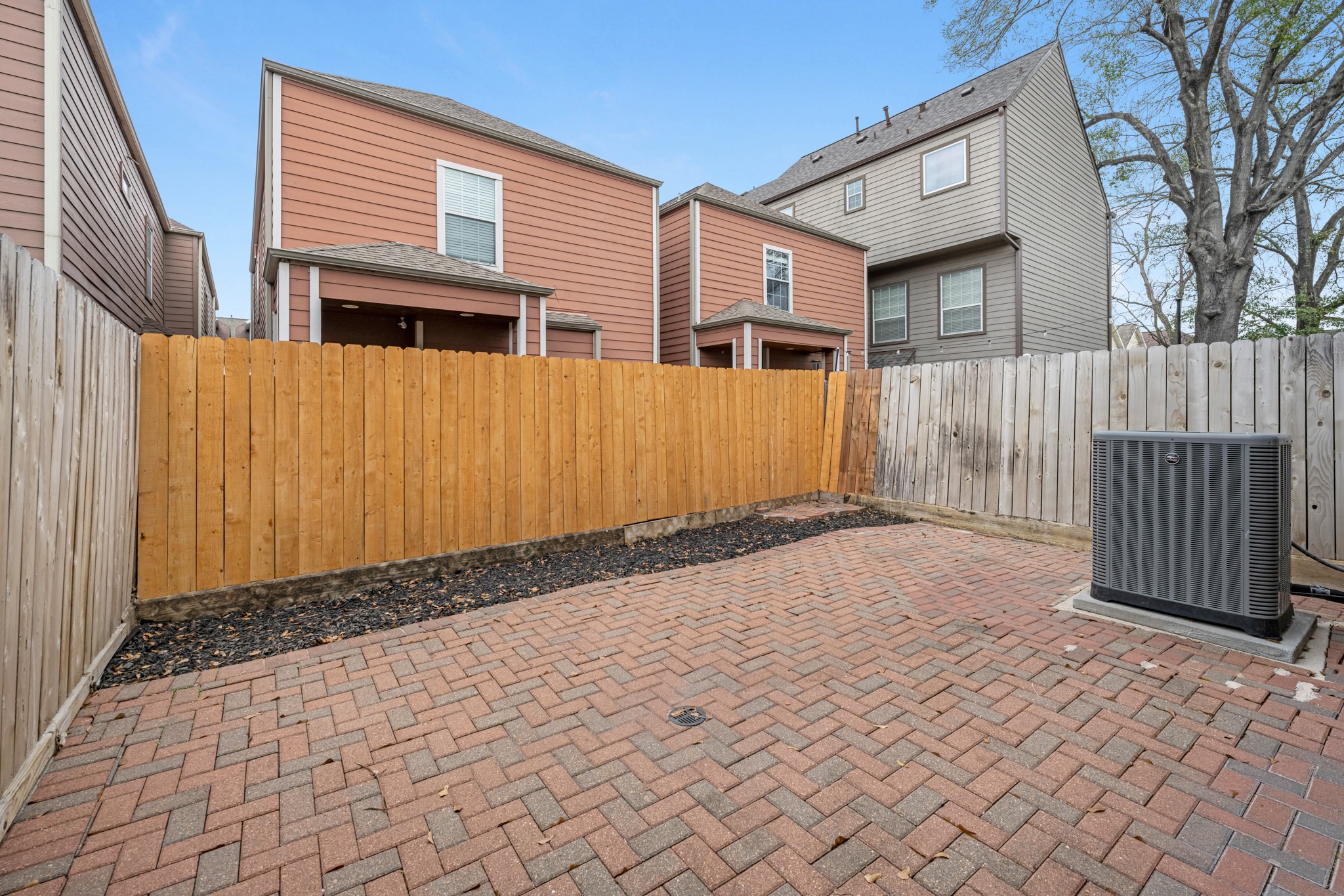 5228 Larkin Street Houston, TX 77007 - Photo 27 of 29 a view of a house with a wooden fence