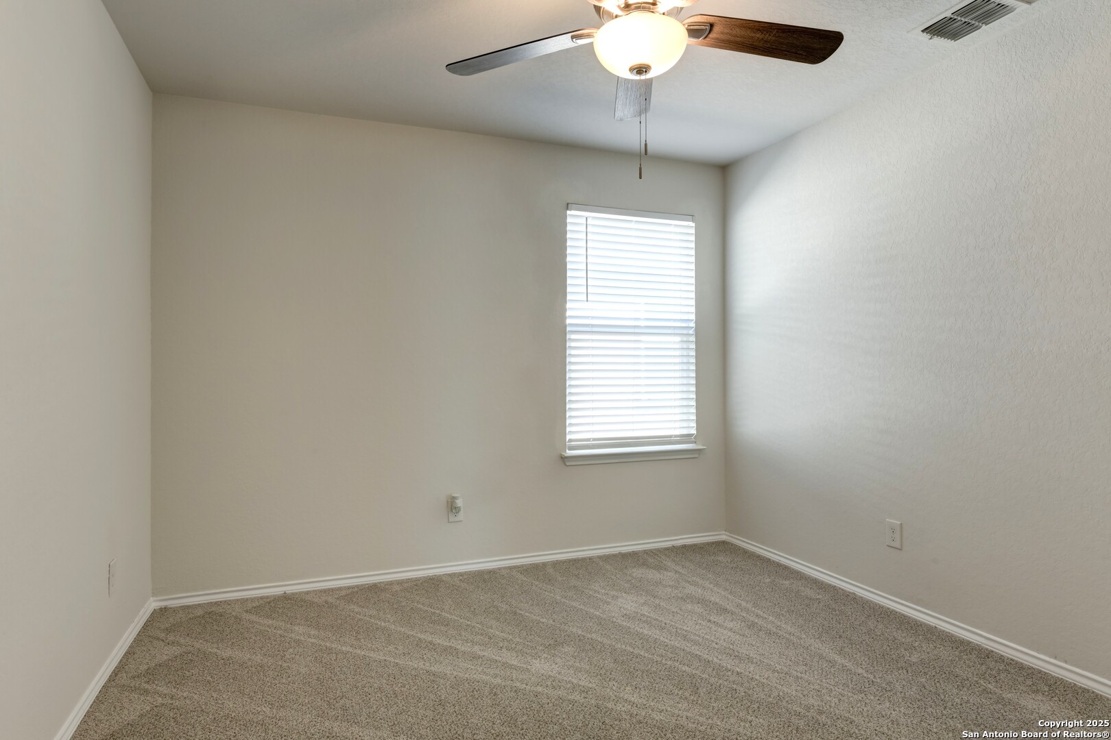 29624 Copper Crossing Bulverde, TX 78163 - Photo 20 of 33 an empty room with a window