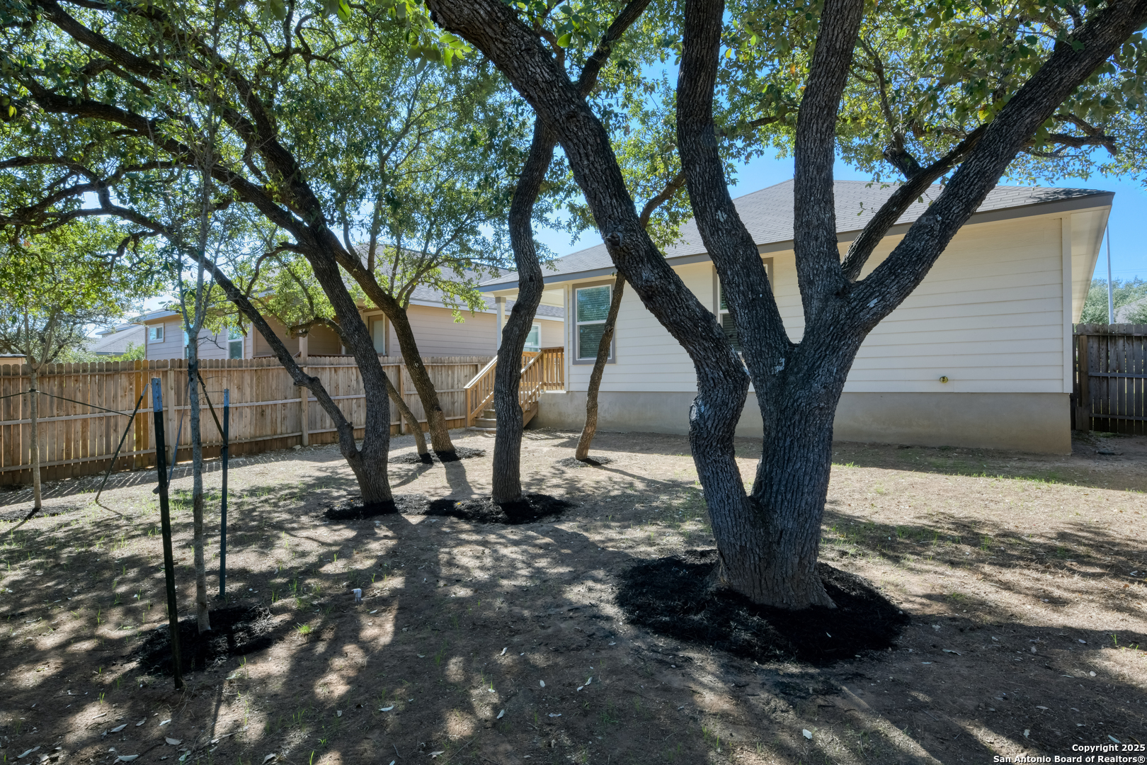 29624 Copper Crossing Bulverde, TX 78163 - Photo 29 of 33 a view of a backyard with large trees