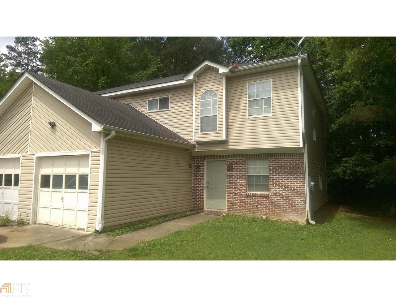3753 Soapstone Road, Unit 70 Decatur, GA 30034 - Photo 1 of 1 a black and white photo of a house