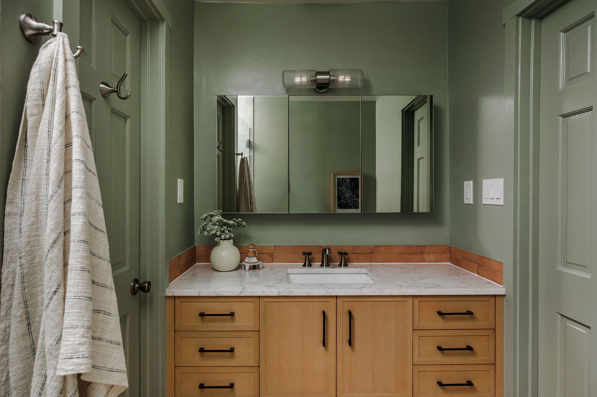 5203 Buffalo Pass Austin, TX 78745 - Photo 18 of 38 a bathroom with a granite countertop sink and a mirror