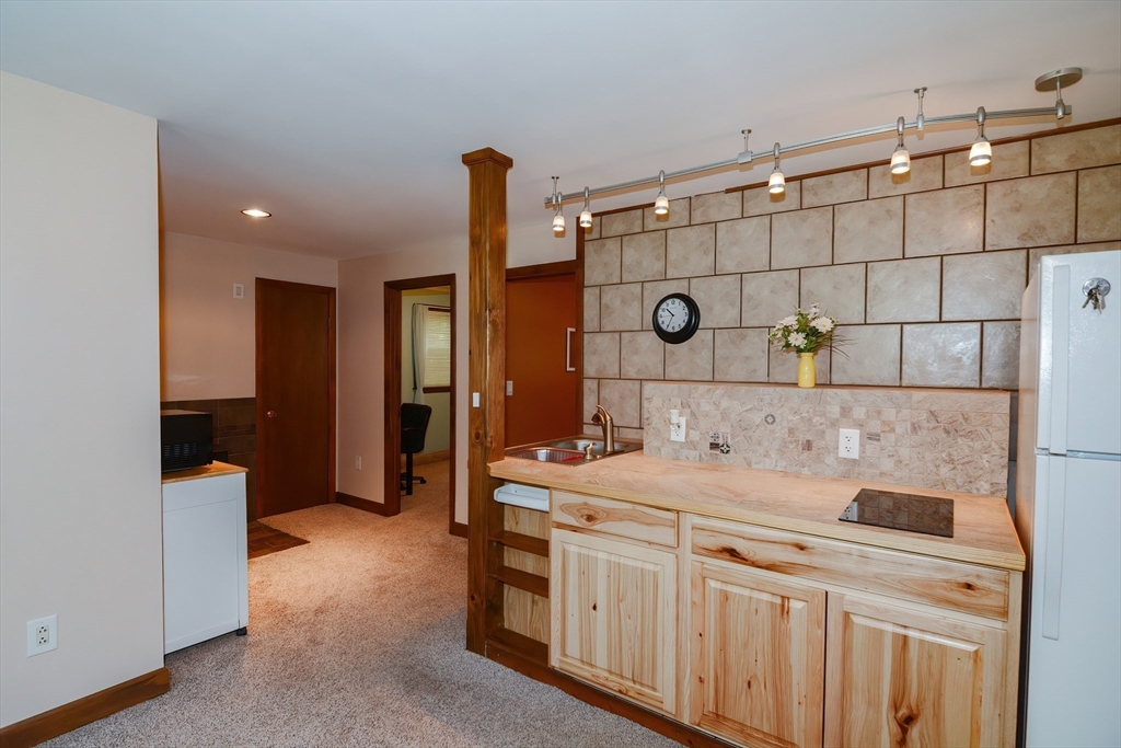 100 Cutler Road Warren, MA 01083 - Photo 29 of 42 a kitchen with a sink and cabinets