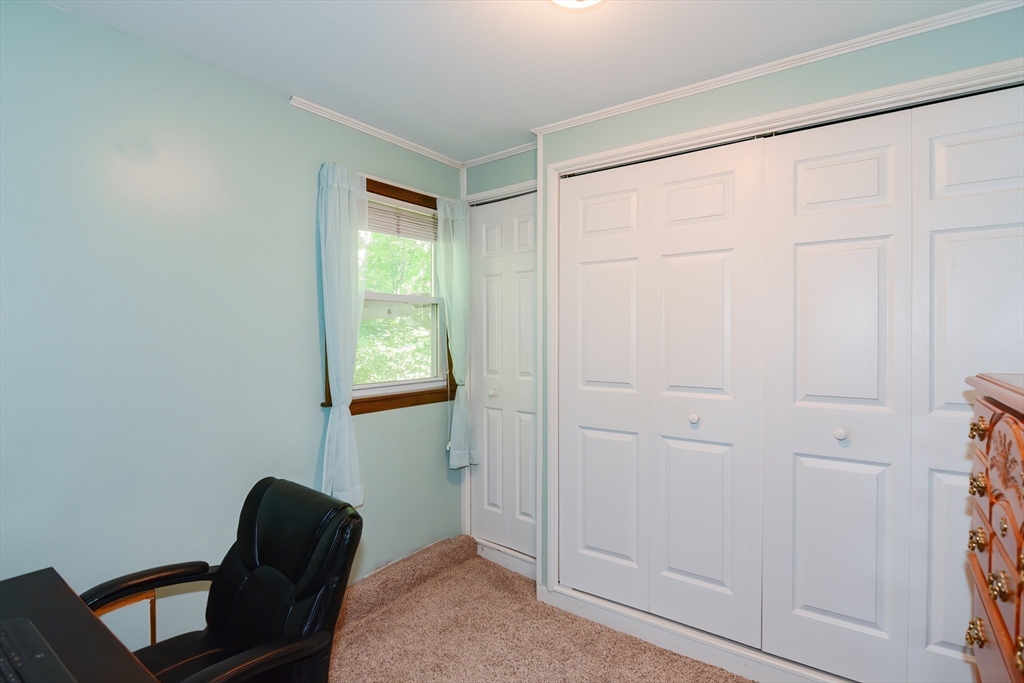 100 Cutler Road Warren, MA 01083 - Photo 32 of 42 a room that has a window and a chair