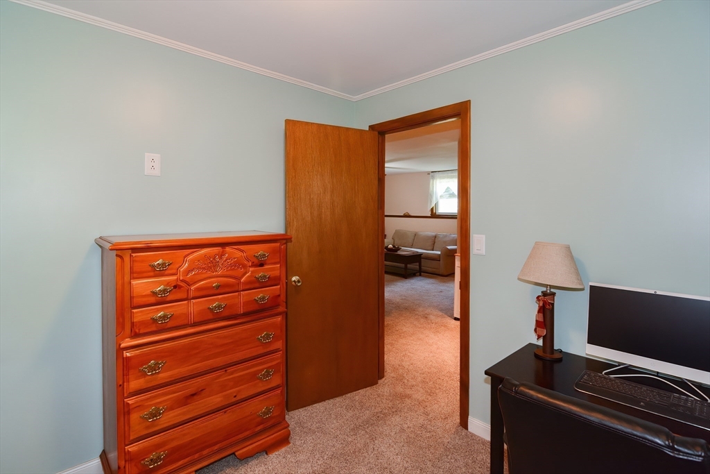 100 Cutler Road Warren, MA 01083 - Photo 33 of 42 a view of room with a flat tv screen and a wooden floor