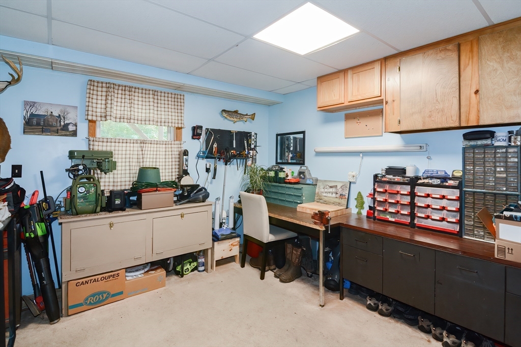 100 Cutler Road Warren, MA 01083 - Photo 35 of 42 a room with furniture a flat screen tv and a window