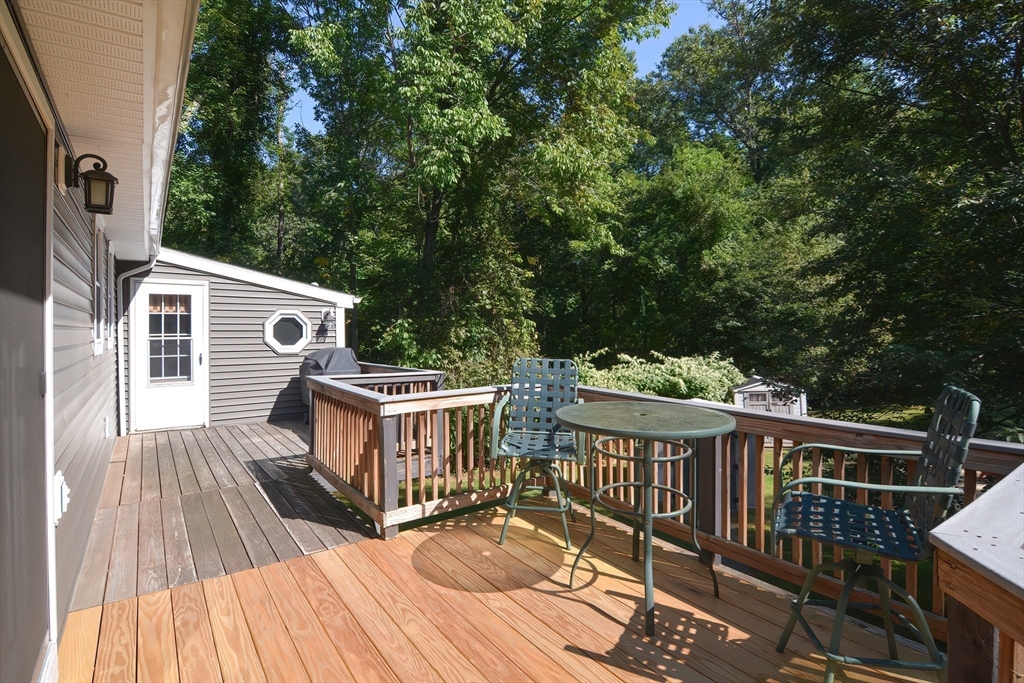 100 Cutler Road Warren, MA 01083 - Photo 37 of 42 a view of a house with backyard and deck