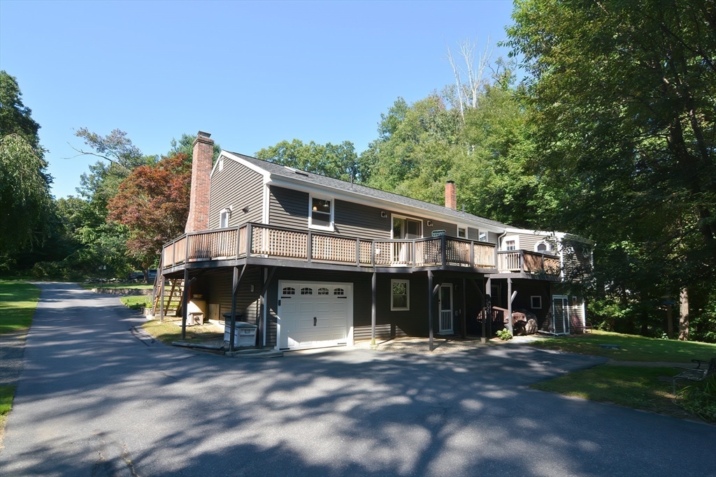 100 Cutler Road Warren, MA 01083 - Photo 38 of 42 a view of a car park in front of house