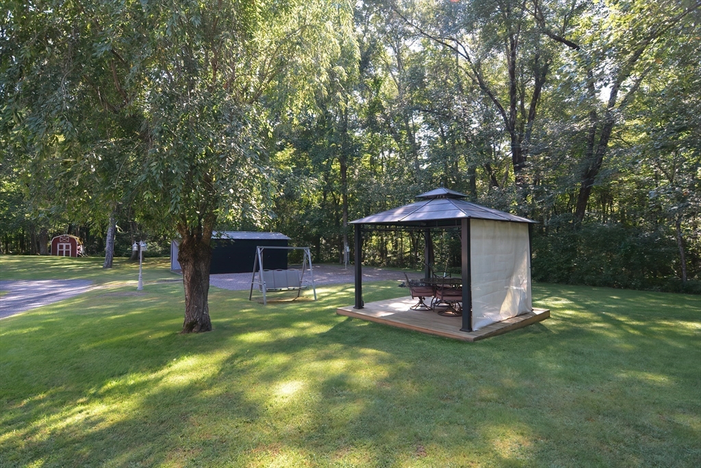 100 Cutler Road Warren, MA 01083 - Photo 39 of 42 a view of a tiny house with a yard