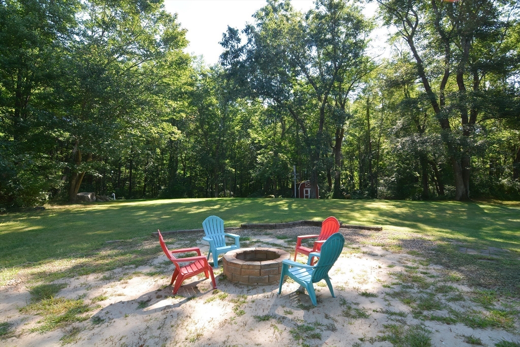 100 Cutler Road Warren, MA 01083 - Photo 40 of 42 a view of a backyard with sitting area
