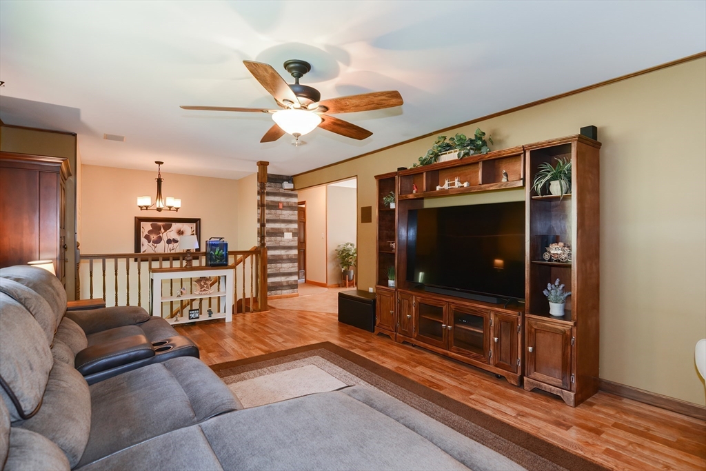 100 Cutler Road Warren, MA 01083 - Photo 9 of 42 a living room with furniture and a flat screen tv