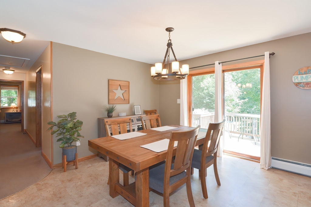100 Cutler Road Warren, MA 01083 - Photo 10 of 42 a view of a dining room with furniture window and outside view