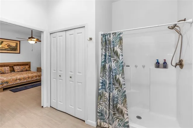 a kitchen with a sink a stove and cabinets