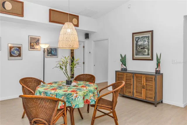 a bedroom with a bed and ceiling fan