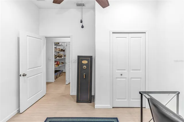 an outdoor space with furniture and umbrella